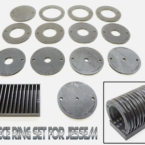 May include: A 13-piece ring set for a Jessem router table. The set includes a variety of sizes and a black metal grid.