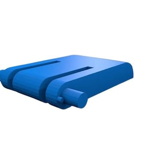 May include: A solid blue, rectangular object with two parallel rectangular cutouts. The object has rounded edges and cylindrical protrusions on one side. The design is simple and modern, with a clean, minimalist aesthetic.