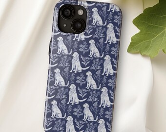 May include: A blue phone case with a white dog pattern. The dogs are sitting in a field of flowers. The case has a camera lens cutout.
