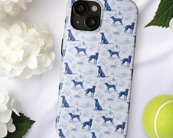 May include: A white phone case with a blue and white pattern of dogs. The case has a camera lens cutout on the back.