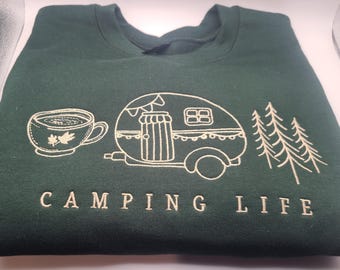 Camping Vibes embroidered sweatshirt, green camp gear, sitting by the fire, cool days and nights. Adventure, nature, outdoor sweatshirt