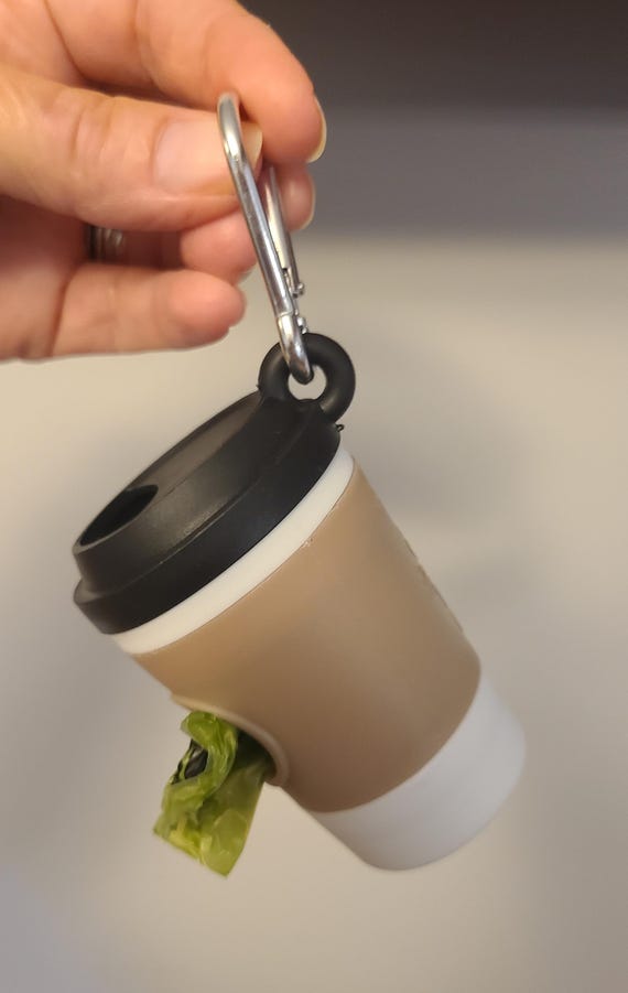 Coffee Cup Cleanup poop holder, pet waste bag, includes two sets of bags.