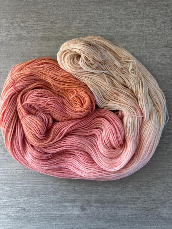 hand dyed variegated yarn fingering weight yarn super wash merino yarn peach semi solid sock yarn pink speckled yarn for knitting crochet