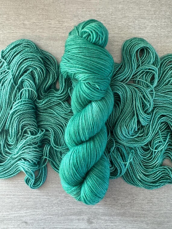 Emerald green tonal yarn hand dyed yarn sock yarn fingering weight yarn super wash merino yarn DK weight silk yarn worsted weight yarn