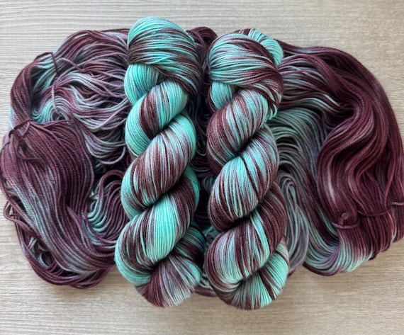 Variegated hand dyed sock yarn burgundy brown teal fingering weight yarn super wash merino wool yarn indie dyed yarn for knitting crochet