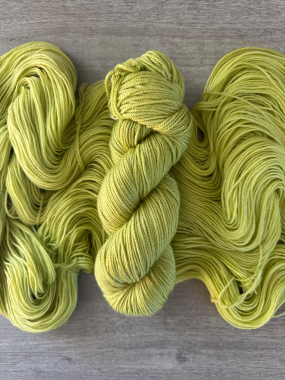 Pea green semi solid yarn hand dyed yarn sock yarn fingering weight yarn super wash merino yarn DK weight silk yarn worsted weight yarn