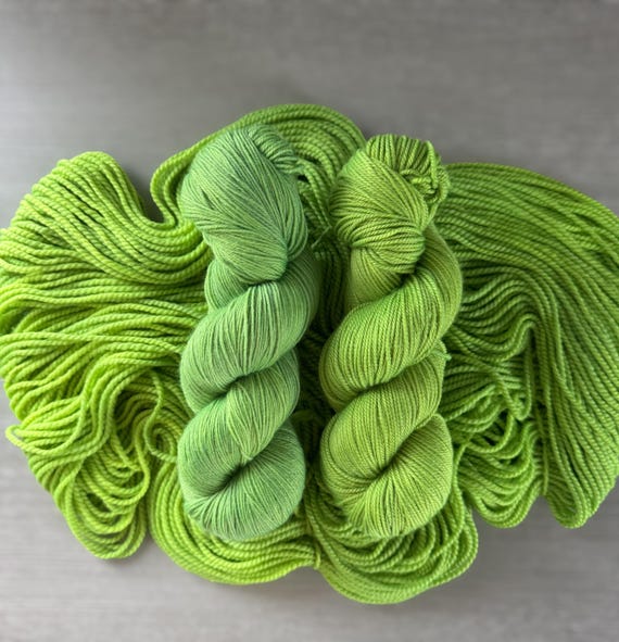 Lime green glazed tonal yarn hand dyed yarn sock yarn fingering weight yarn super wash merino yarn DK weight silk yarn worsted weight yarn