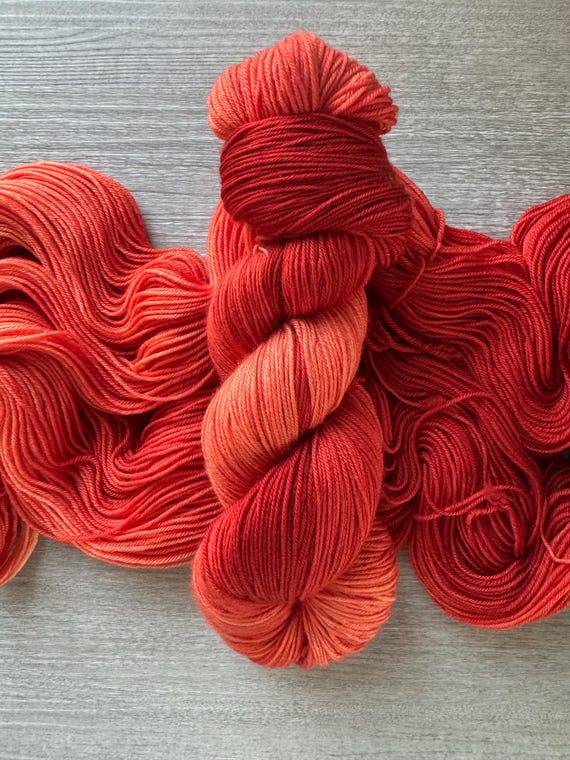 Saffron red hand dyed yarn ombre gradient sock yarn fingering weight yarn super wash merino yarn DK weight orange tonal striping yarn