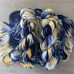 Variegated hand dyed sock yarn blue yellow fingering weight yarn blue jeans super wash merino wool yarn indie dyed yarn for knitting