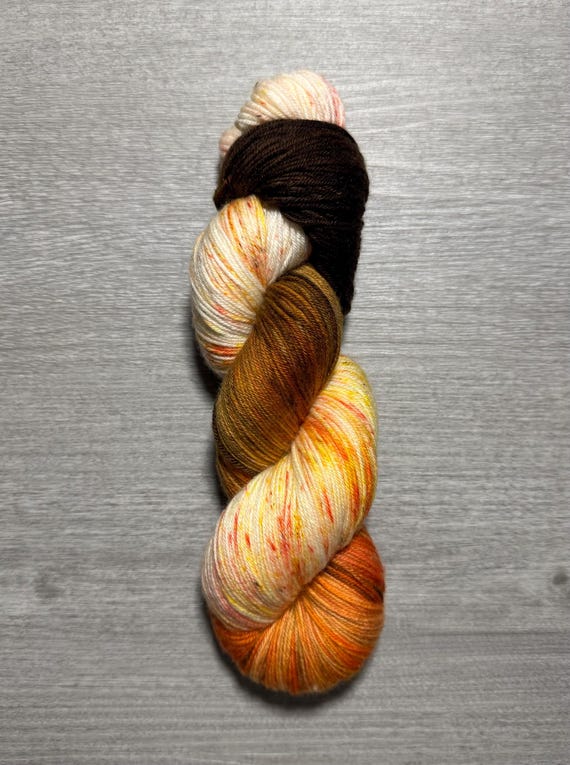 hand dyed yarn variegated sock yarn fingering weight speckled yarn super wash merino wool yarn brown yellow orange yarn for knitting socks