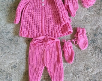 Hand knit baby outfit