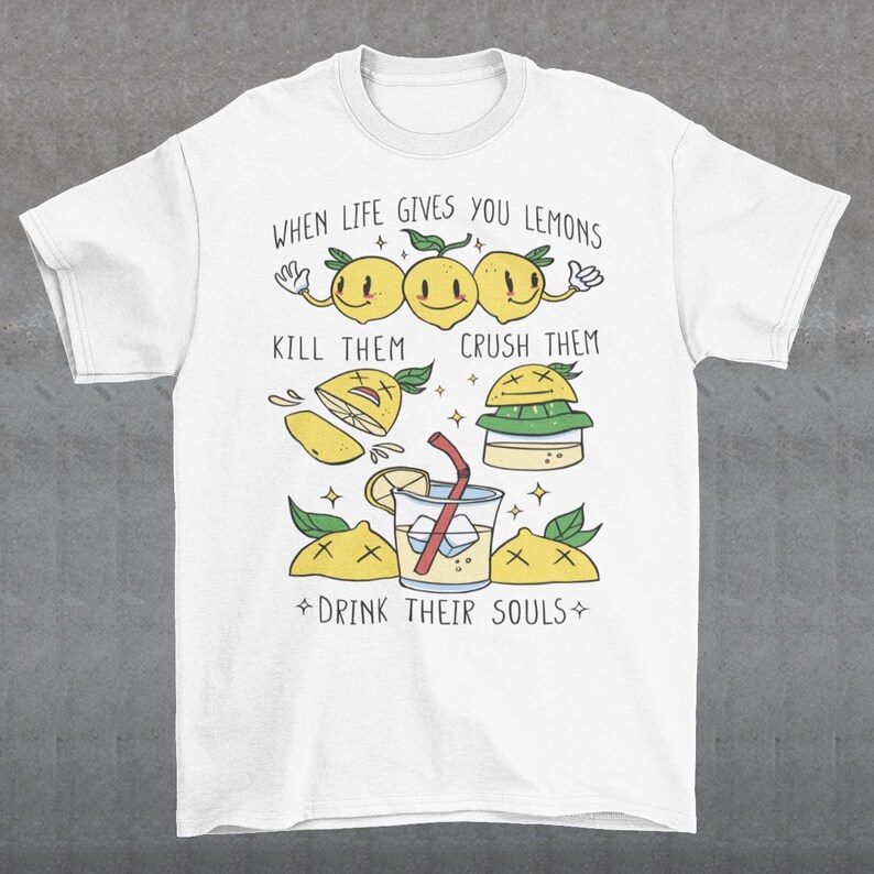Introducing our adorable and quirky Lemonade-themed t-shirt that is sure to turn heads and bring a smile to your face! This shirt features a delightful design showcasing cute lemons being transformed into delicious lemonade, accompanied by the bold, tongue-in-cheek text: "WHEN LIFE GIVES YOU LEMONS, KILL THEM, CRUSH THEM AND DRINK THEIR SOULS."