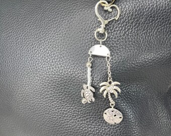 Ciondolo per auto costiero: palma argentata, dollaro di sabbia e tartaruga marina