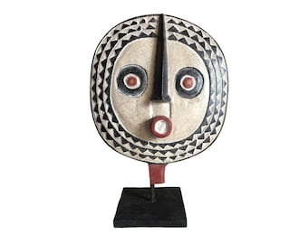 アフリカのブワ族の太陽のマスク：木彫りの部族の壁画アート - Etsy 日本