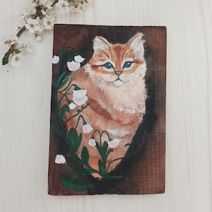 Orange Cat Surrounded by Wild Flowers, hand painted, on wood with acrylic paint. Interior decoration. House decoration. Bedroom decoration.