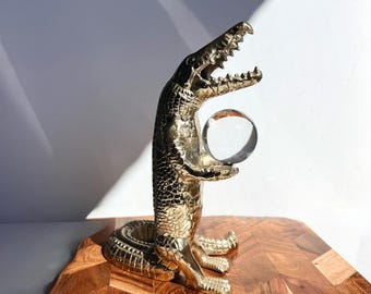 Gold-toned Metal and Glass Alligator Figurine with Clear Glass Sphere 10” x 4”
