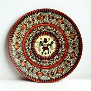 May include: A rustic wooden sign with the text "Welcome to our home" in white lettering. The sign features a distressed finish and a simple, inviting design, perfect for a front porch or entryway.