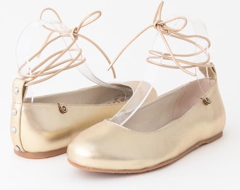 The Blakely Ballet Flat. Leather slip on, stud heel tab with optional leather tie.