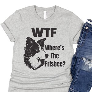 Bella and Canvas crew neck t-shirt; funny dog owner t-shirt adorned with a dog face and the phrase "WTF, where's the frisbee?"