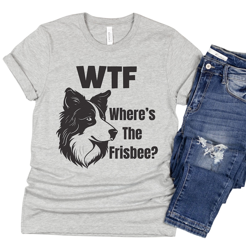 Bella and Canvas crew neck t-shirt; funny dog owner t-shirt adorned with a dog face and the phrase "WTF, where's the frisbee?"