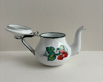 Old enameled teapot.