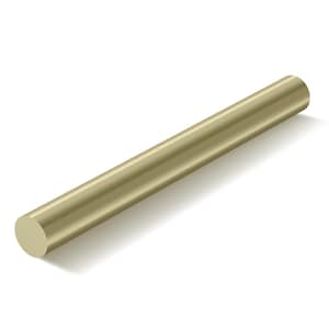 May include: A cylindrical, golden-colored metal rod. The rod is smooth and has a consistent diameter along its length. The ends of the rod are flat and perpendicular to the sides. The rod is lying on a white surface.