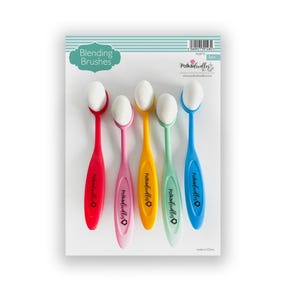 May include: Five blending brushes with white sponge tips. The brushes are red, pink, yellow, green, and blue. The handles are labelled "Polka Dot doodles".