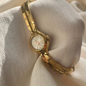 Elegant Vintage 1960s Mechanical Wind Up Rolled Gold Plated Bracelet Strap Ladies Dress Cocktail Wristwatch With Small Gold Dial By Laconda