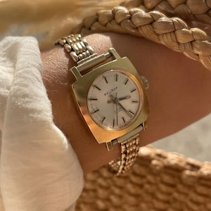 Vintage jaren 1970 17 juwelen Zwitsers handmatig opwindbare wijzerplaat vergulde ring en gerolde gouden schakelband cocktailjurk damespolshorloge van Belinda