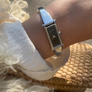 Gucci watch 1500 series sales