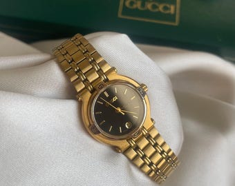 Impresionante reloj de pulsera Gucci vintage de los años 90, chapado en oro 9200L, con correa de eslabones y esfera negra, para mujer, en excelente estado.