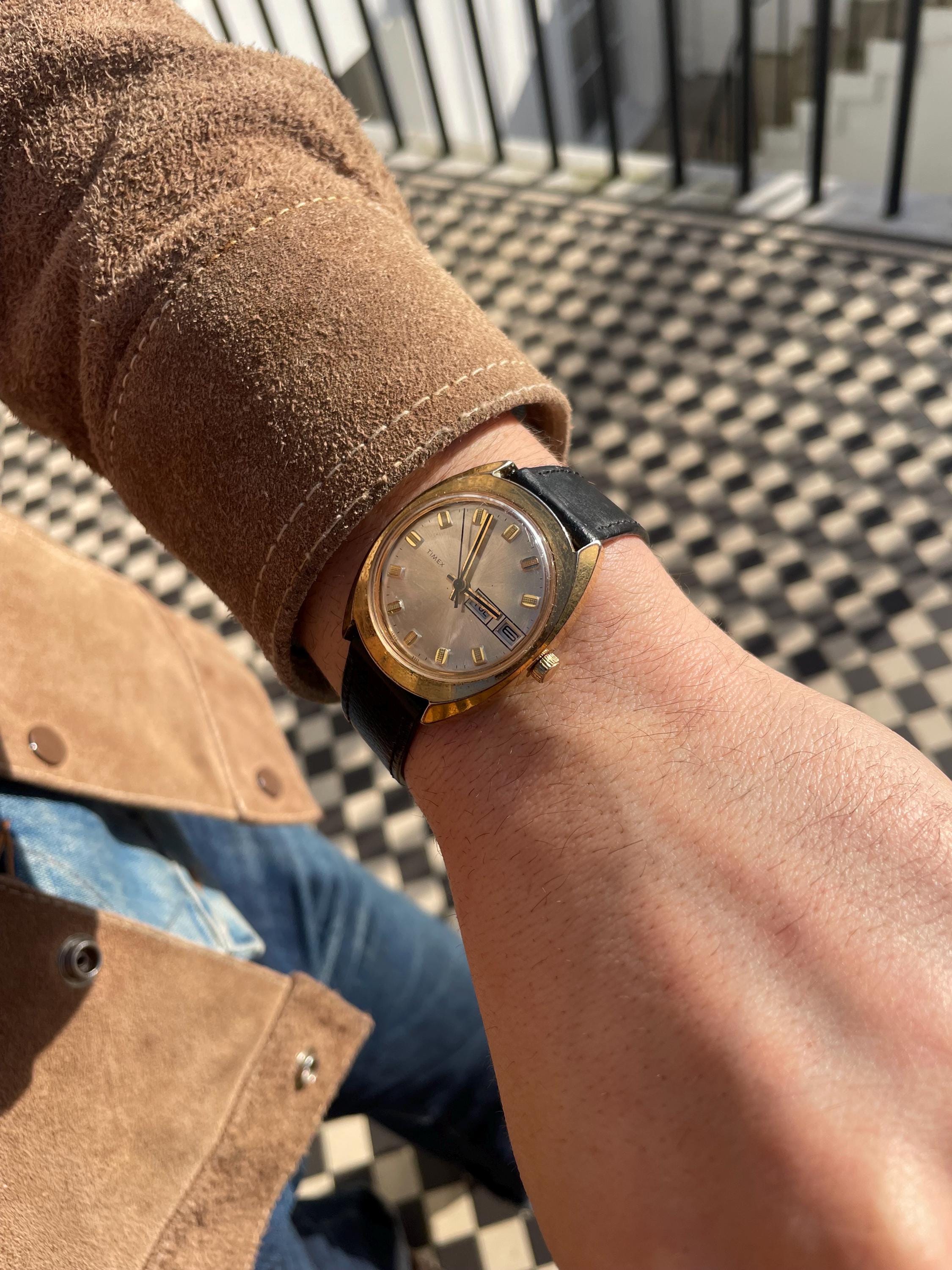 Timex vintage 70s gold bezel white dial manual mechanical black leather watch Vintage 1970s Timex tank wrist watch manual winding in  main image 3