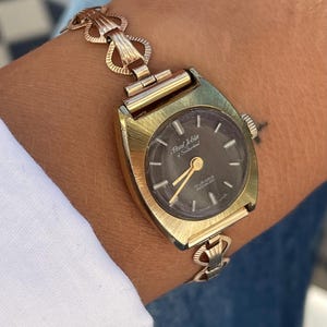 Vintage 1970s Swiss Manual Wind Up 17 Jewels Rolled Gold Dainty Strap Brown Dial Ladies Cocktail Bracelet Wristwatch By Paul Jobin