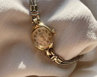 Vintage 1950s Mid Century Wind Up Rolled Gold Round Cream Dial Ladies Bracelet Dainty Snake Chain Strap Cocktail Wristwatch By Ingersoll