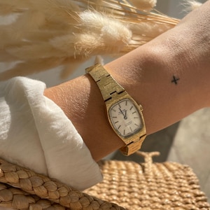 Vintage 1970s 17 Jewels Swiss Incabloc Brushed Gold Plated Wind Up Mechanical Ladies Cocktail Wristwatch By Montine Of Switzerland.
