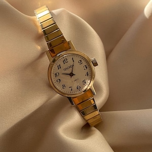 Vintage 1970s USSR 17 Jewels Wind Up Round Dainty Dial Ladies Everyday Wristwatch With Gold Tone Ribbed Stretchy Bracelet Strap Sekonda