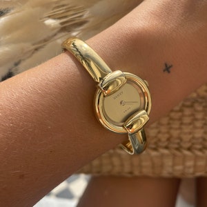 GUCCI 1400L Watch Gold Pink Shell Dial QZ Women's Bangle