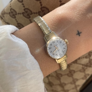 Vintage 1970s 17 Jewels Wind Up Small Round Dainty Dial Ladies Everyday Wristwatch With Gold Tone Ribbed Stretchy Bracelet Strap Sekonda