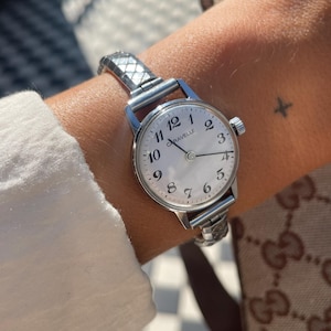 Vintage Ladies Swiss Made 1970s Wind Up Silver St. Steel Round Case & Stretchy Strap Round Dial Wristwatch By Caravelle
