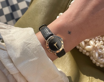 Reloj Gucci vintage, chapado en oro de 18 quilates, esfera negra, correa de piel