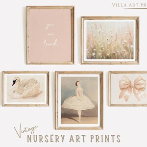 May include: Set of five vintage nursery art prints in light wood frames. The prints feature a swan, a ballerina, a bow, a field of flowers, and a pink print with the text "you are loved".
