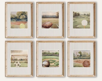 May include: Six framed watercolor prints featuring vintage sports scenes. The prints depict tennis, football, golf, soccer, baseball, and basketball. Each framed print has a striped background and a wooden frame. The text "VILLA ART PRINTS" and "Vintage SPORT ART PRINTS" are visible.