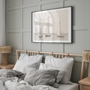 May include: A bedroom with a wooden bed frame and a framed painting of sailboats above the headboard. The bed is made with white and gray striped bedding and white pillows.