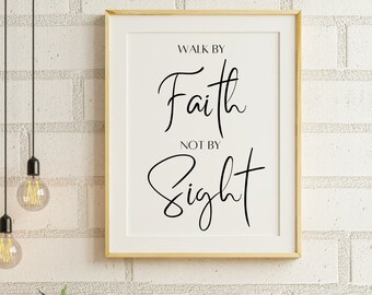 May include: A framed print with the text "Walk by Faith not by Sight" hanging on a white brick wall above a wooden desk with a chair. There are three small sticky notes on the desk with the words "Thankful", "Faith", and "Trust".