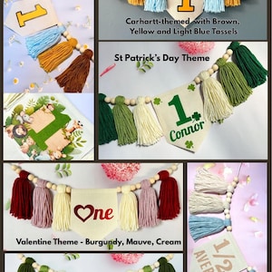 May include: A collection of decorative banners featuring fabric pennants, wooden beads, and yarn tassels in various color palettes. The pennants display numbers, names, and graphics including hearts, shamrocks, and safari animals for celebrations.