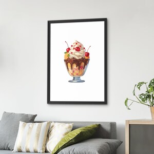 May include: A framed print of a digital illustration of a delicious-looking dessert. The dessert is in a clear glass bowl and features layers of whipped cream, chocolate sauce, and cherries. The cherries are bright red, and the whipped cream is fluffy and white. The chocolate sauce is rich and dark. The overall color scheme is vibrant and appetizing. The image is perfect for adding a touch of sweetness to any room.