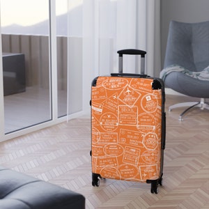 Orange Passport Stamps Suitcase, World Traveler, Available In 3 Sizes, Carry On 22 in, M 27 in, L 31 in, 360 Degree Swivel Wheels