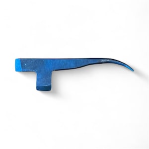 May include: A blue metal tool with a T-shaped handle and a curved, pointed end. The tool is painted in a solid blue color and appears to be made of metal. The tool is designed for a specific purpose, likely in the construction or repair field.