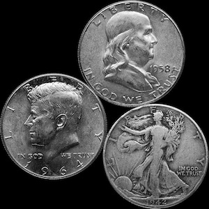 May include: Three silver US half dollar coins. The coins feature the profiles of Franklin, John F. Kennedy, and Lady Liberty. The dates on the coins are 1958, 1964, and 1942.