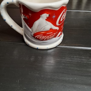 2004 Vintage Large Polar Bear Coca-Cola Christmas mug.